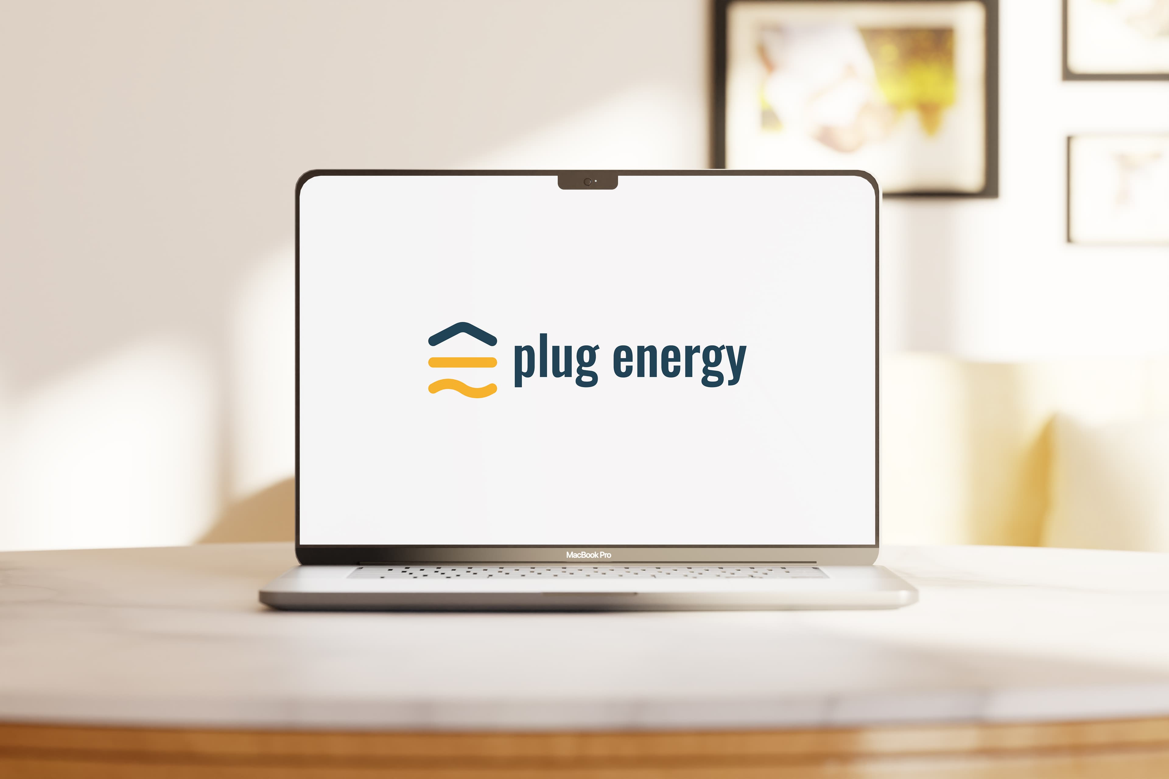 laptop with logo of plug energy